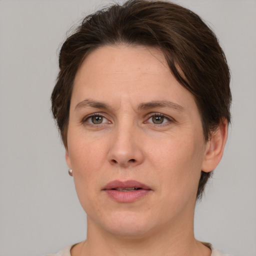 Neutral white adult female with short  brown hair and brown eyes