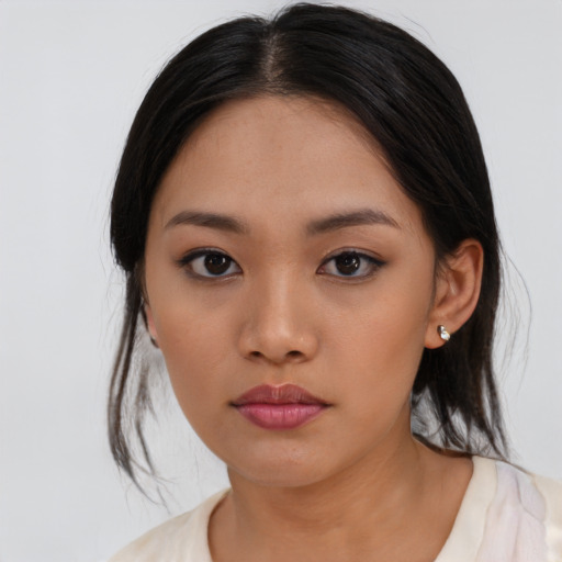 Neutral asian young-adult female with medium  black hair and brown eyes