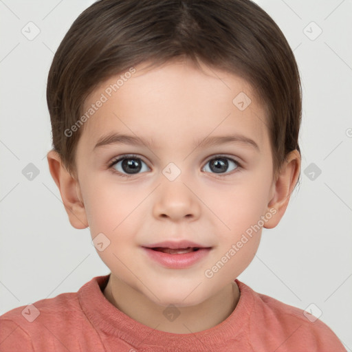 Joyful white child male with short  brown hair and brown eyes