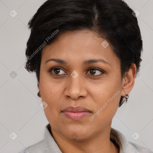 Joyful black young-adult female with short  brown hair and brown eyes