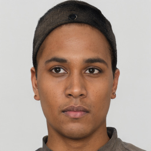 Neutral black young-adult male with short  black hair and brown eyes
