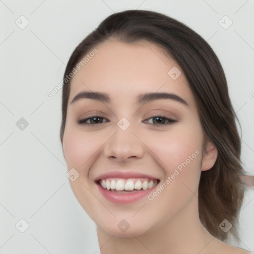 Joyful white young-adult female with medium  brown hair and brown eyes