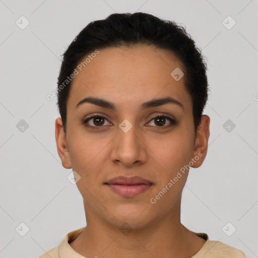 Joyful latino young-adult female with short  black hair and brown eyes