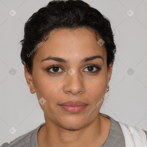 Joyful latino young-adult female with short  black hair and brown eyes