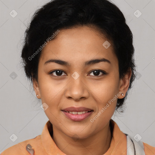 Joyful latino young-adult female with short  brown hair and brown eyes