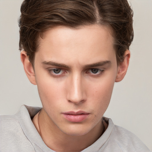 Neutral white young-adult male with short  brown hair and grey eyes