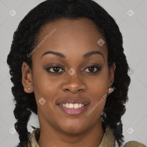 Joyful black young-adult female with long  brown hair and brown eyes