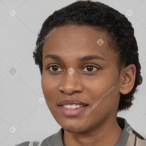 Joyful black young-adult female with short  black hair and brown eyes