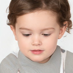 Joyful white child female with short  brown hair and brown eyes