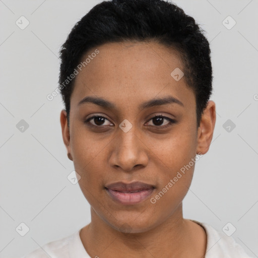 Joyful black young-adult female with short  black hair and brown eyes