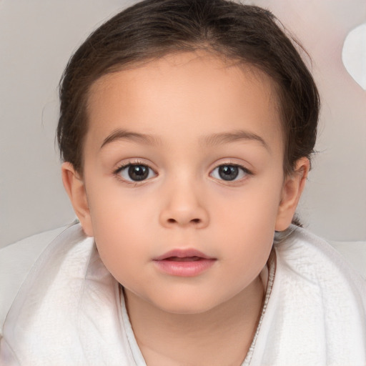 Neutral white child female with medium  brown hair and brown eyes