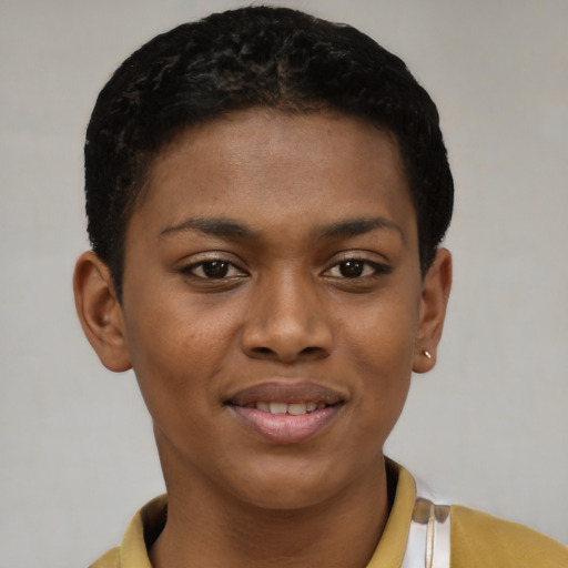 Joyful black young-adult female with short  brown hair and brown eyes