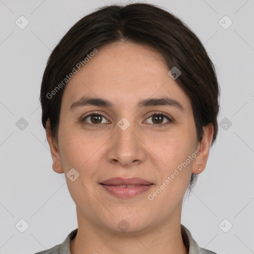 Joyful white young-adult female with short  brown hair and brown eyes