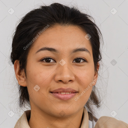 Joyful asian adult female with medium  brown hair and brown eyes