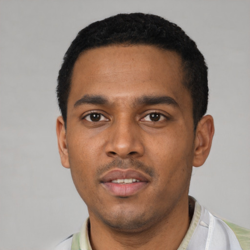 Neutral latino young-adult male with short  black hair and brown eyes