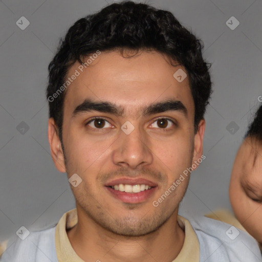 Joyful latino young-adult male with short  brown hair and brown eyes