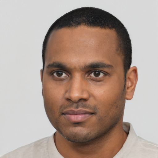 Neutral black young-adult male with short  black hair and brown eyes
