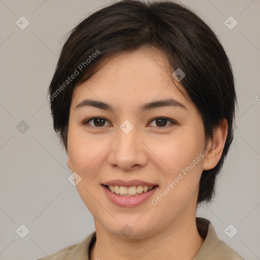 Joyful asian young-adult female with medium  brown hair and brown eyes