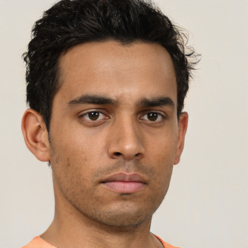 Neutral white young-adult male with short  black hair and brown eyes