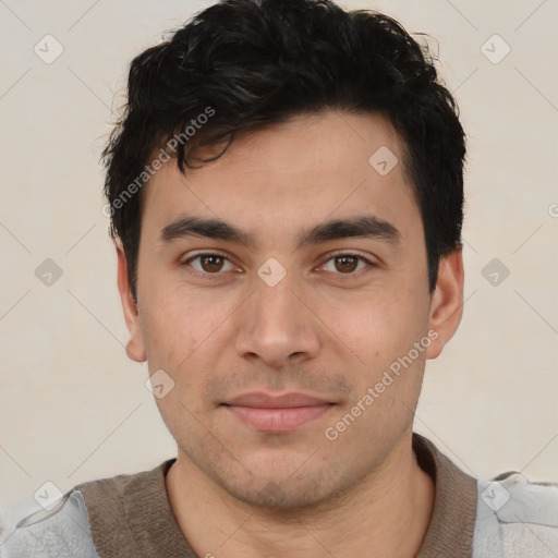 Joyful white young-adult male with short  black hair and brown eyes