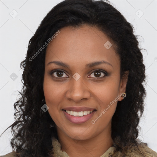 Joyful black young-adult female with long  brown hair and brown eyes