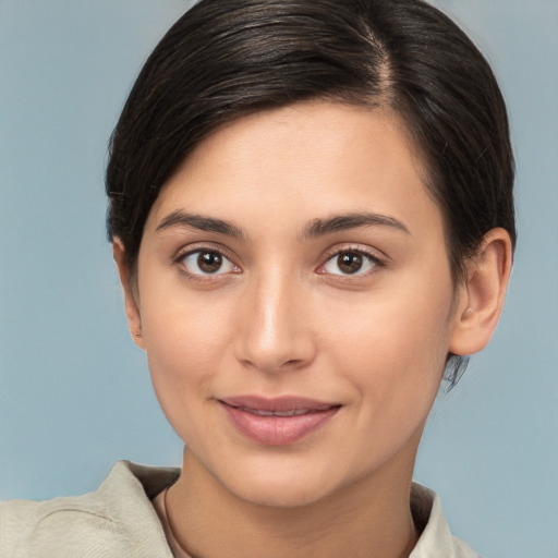 Joyful white young-adult female with medium  brown hair and brown eyes