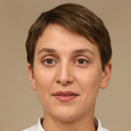 Joyful white adult female with short  brown hair and brown eyes