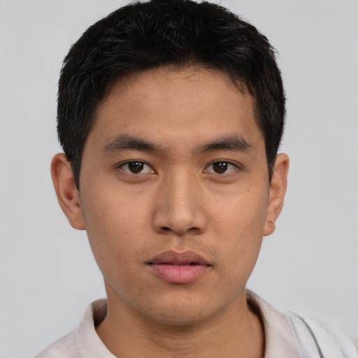 Neutral asian young-adult male with short  black hair and brown eyes