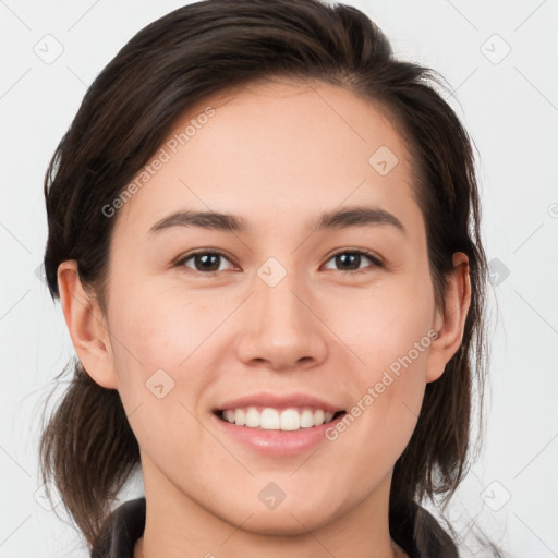 Joyful white young-adult female with medium  brown hair and brown eyes