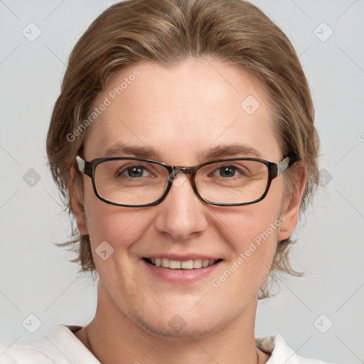 Joyful white adult female with medium  brown hair and grey eyes