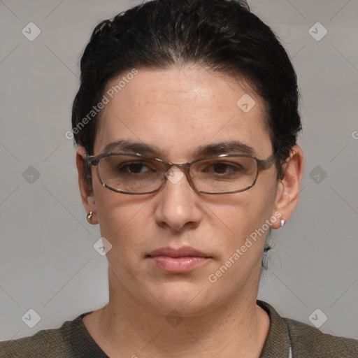 Joyful white adult female with short  brown hair and brown eyes