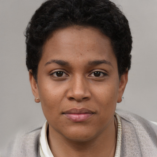 Neutral black young-adult female with short  brown hair and brown eyes