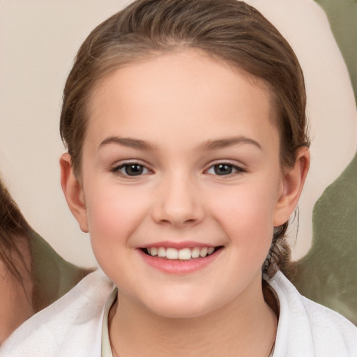 Joyful white child female with medium  brown hair and brown eyes