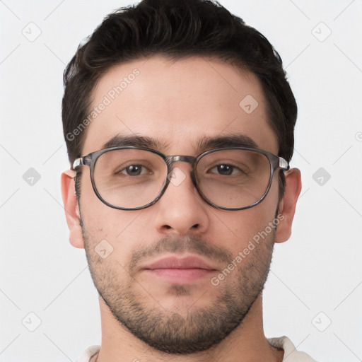 Neutral white young-adult male with short  brown hair and brown eyes