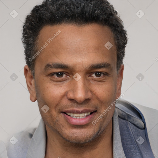 Joyful latino young-adult male with short  brown hair and brown eyes