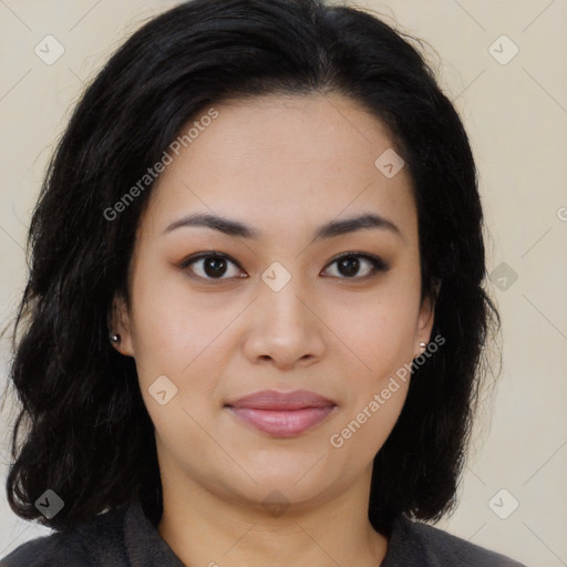 Joyful latino young-adult female with long  black hair and brown eyes