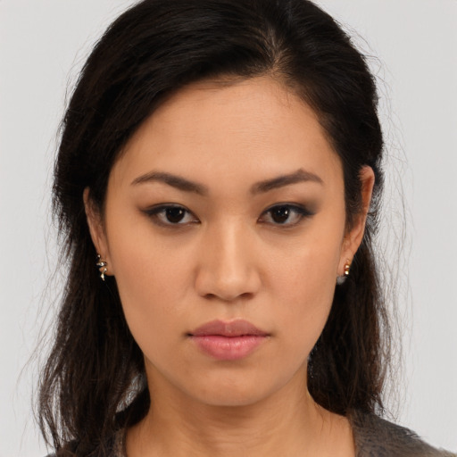 Neutral asian young-adult female with long  brown hair and brown eyes
