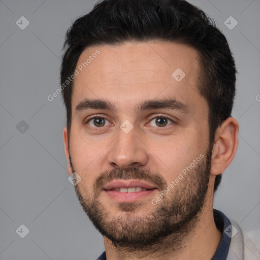 Neutral white young-adult male with short  black hair and brown eyes