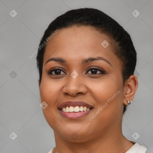 Joyful latino young-adult female with short  brown hair and brown eyes