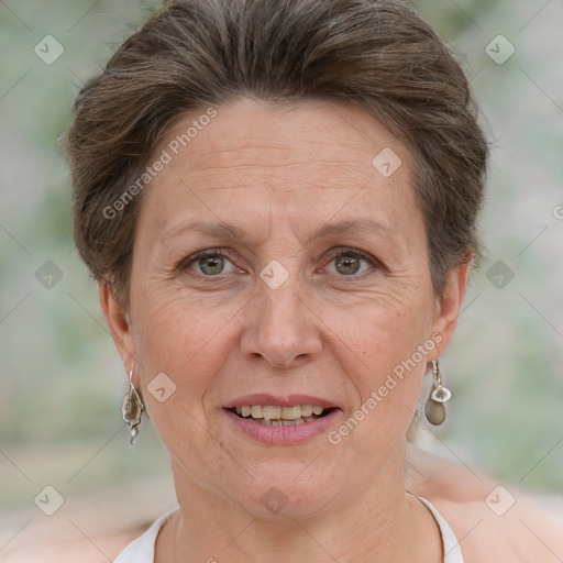 Joyful white adult female with short  brown hair and brown eyes