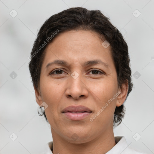 Joyful white adult female with short  brown hair and brown eyes