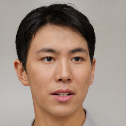 Neutral asian young-adult male with short  brown hair and brown eyes