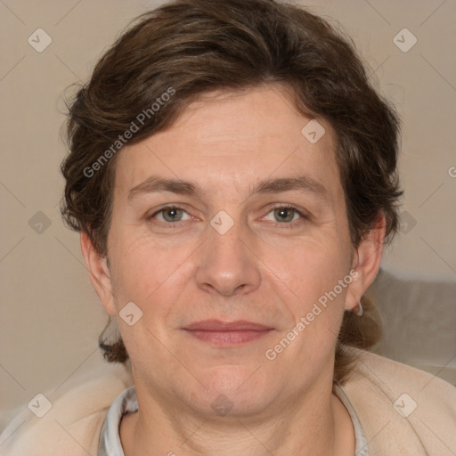 Joyful white adult female with short  brown hair and brown eyes