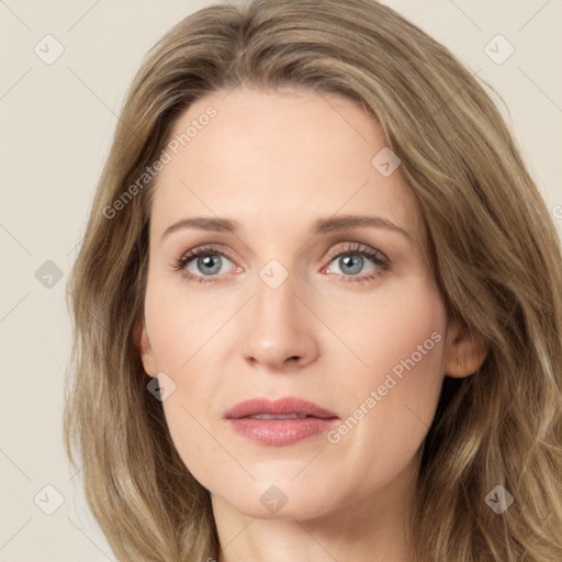 Joyful white young-adult female with long  brown hair and green eyes