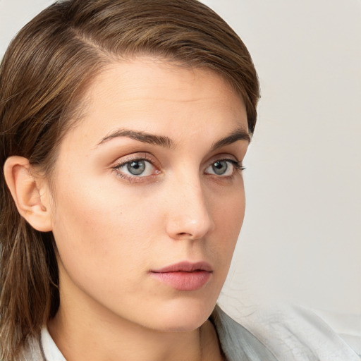 Neutral white young-adult female with medium  brown hair and grey eyes