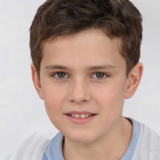 Joyful white child male with short  brown hair and brown eyes