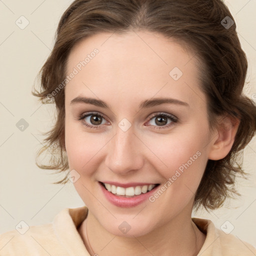 Joyful white young-adult female with medium  brown hair and green eyes