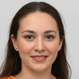 Joyful white young-adult female with medium  brown hair and brown eyes