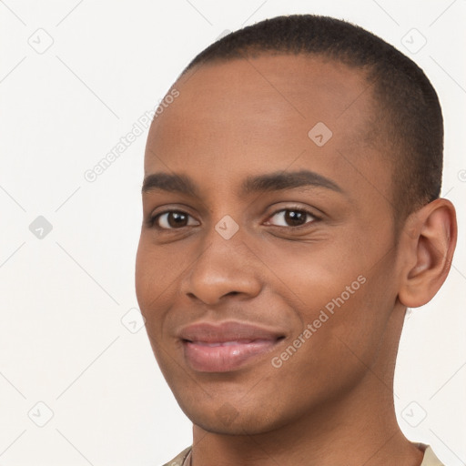 Joyful black young-adult male with short  brown hair and brown eyes