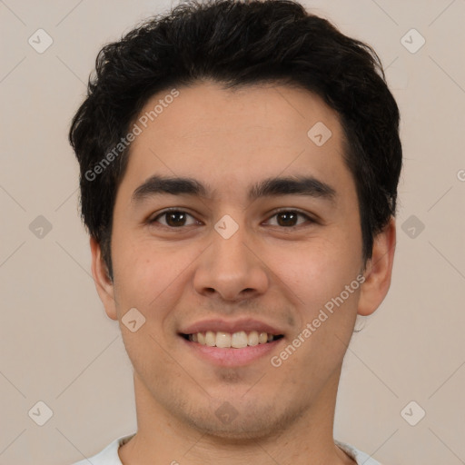 Joyful latino young-adult male with short  brown hair and brown eyes